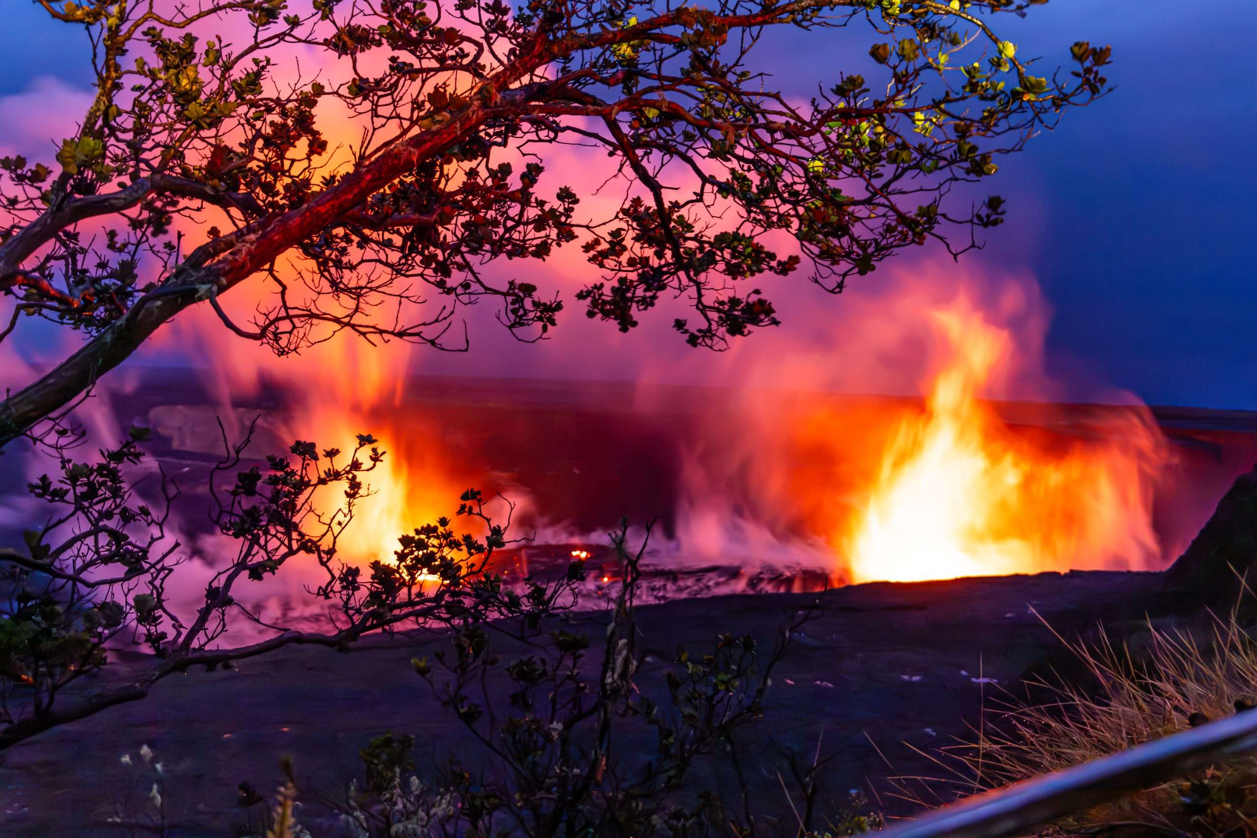 Beautiful coloration in the sky created by an eruption at Halema'uma'u caldera in Hawaii Volcanoes National Park. Guests during a Big Island Waterfalls and Volcanoes Tour got to experience the excitement!