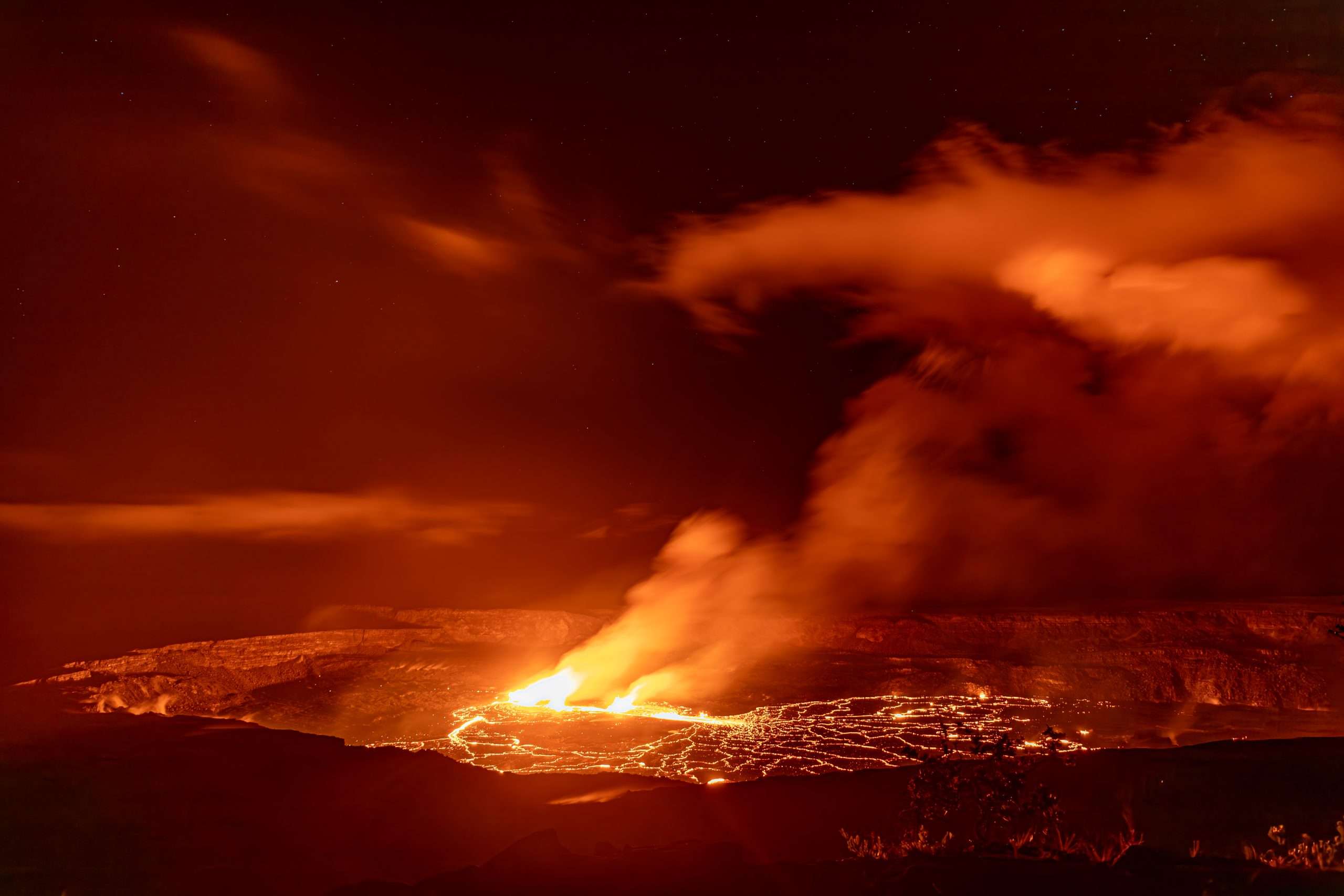Kilauea lava tours viewing a night eruption at Halema'uma'u, Hawaii Volcanoes National Park.