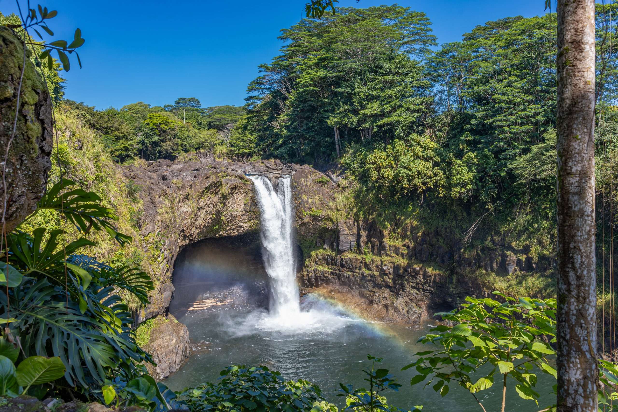 A beautiful rainbow created by the mist of the Wailuku River at Rainbow Falls.