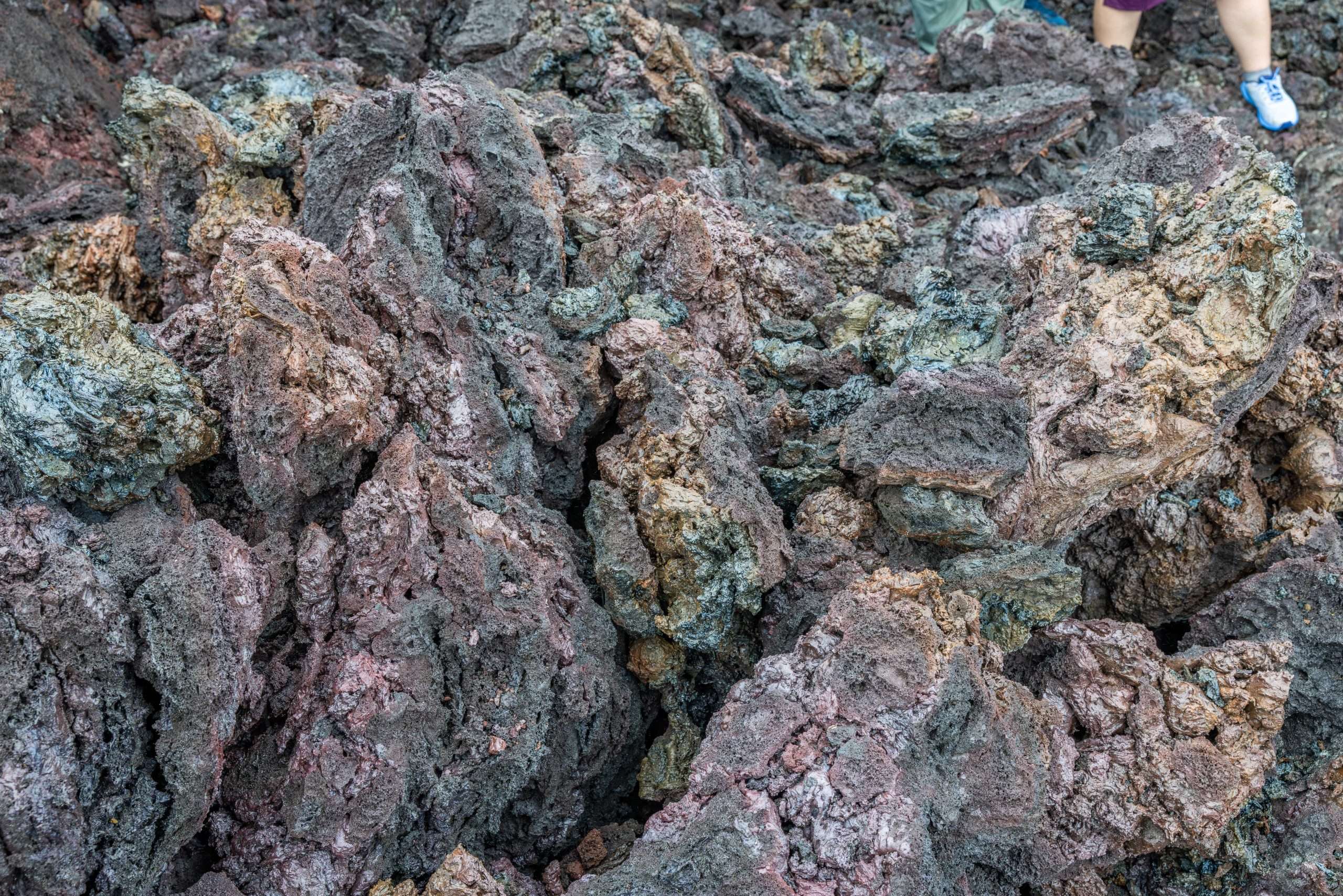 The unique colors of lava during a Volcanoes National Park tour.