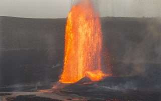 Lava flowing from Kilauea volcano on a Hilo Shore Excursion.