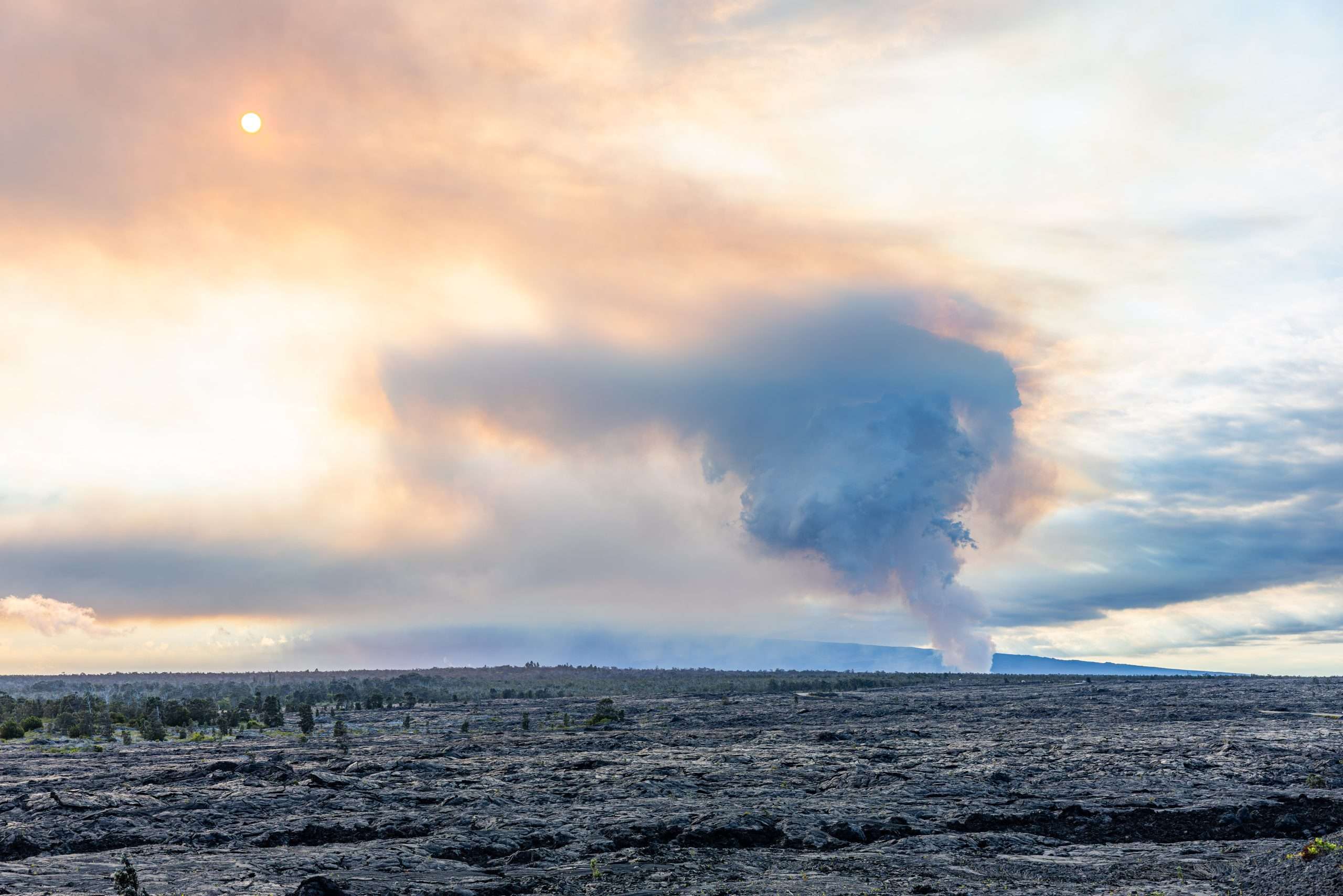 Volcanic cloud rising over Hawai'i Volcanoes National Park during a Big Island tour.