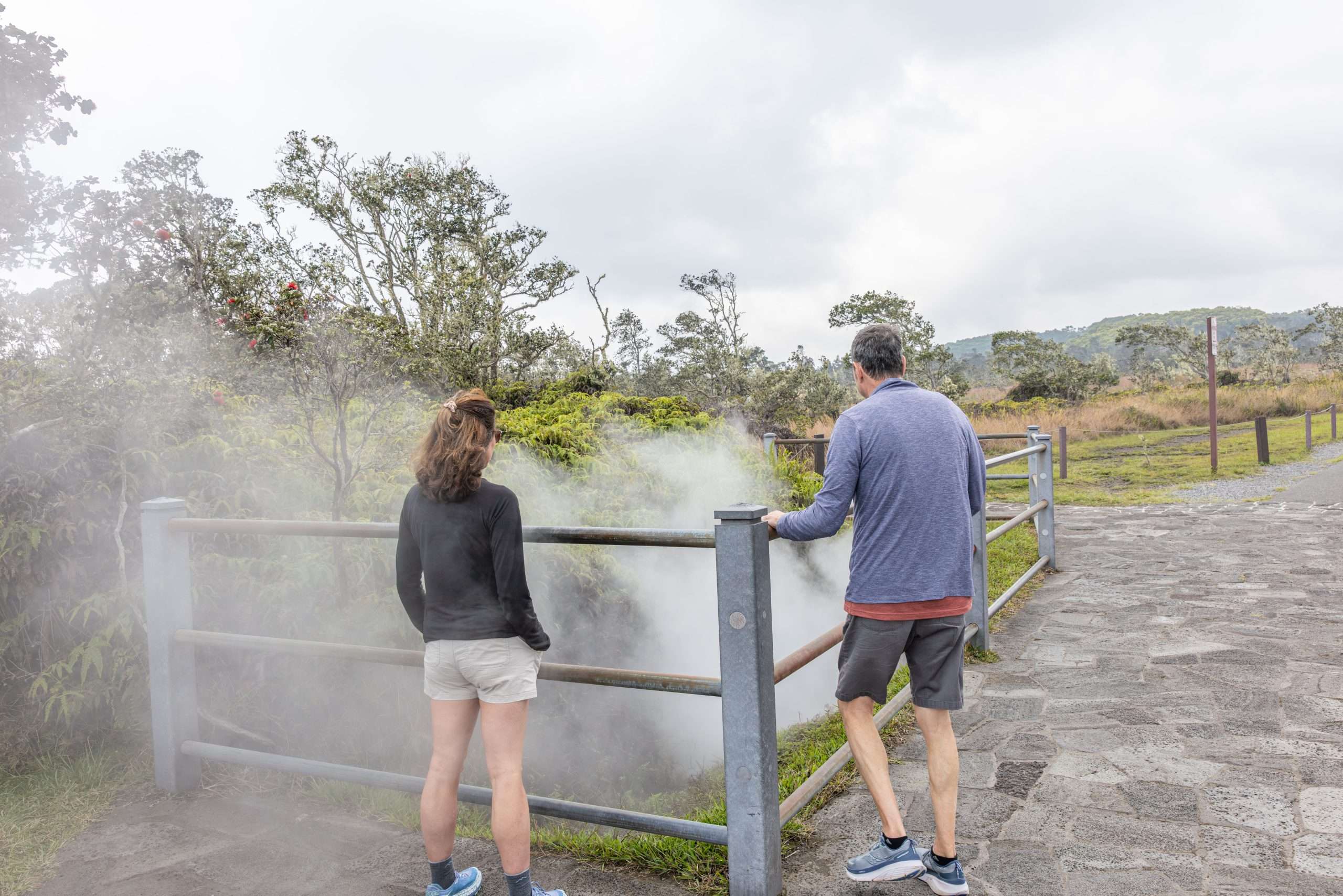 Big Island lava tour guests stopping at the steam vents in Volcanoes National Park.