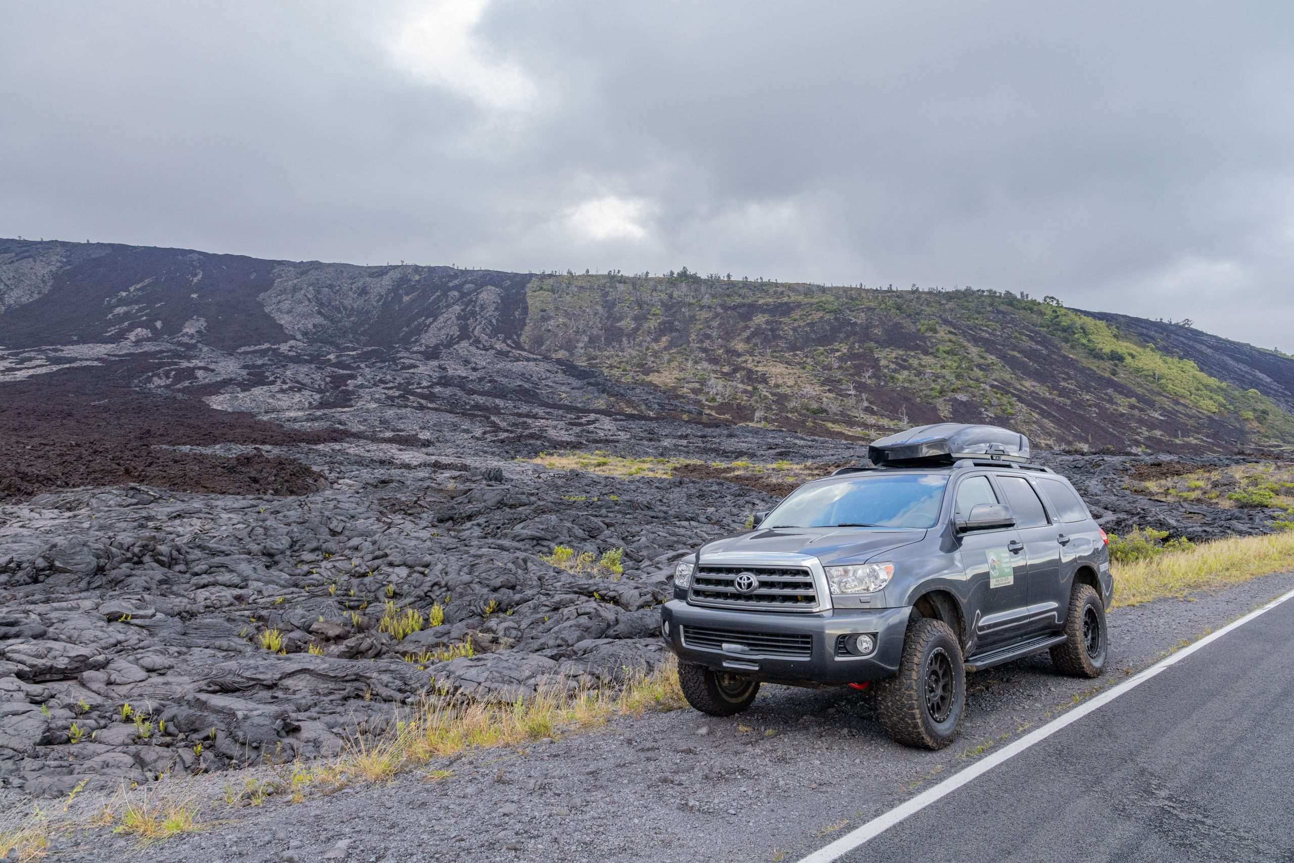 Big Island adventure tour vehicle in front of Holei Pali, Hawaii Volcanoes National Park, volcano tour Hawaii Big Island